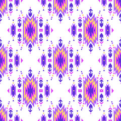 Fototapeta na wymiar Vector colorful seamless decorative ethnic pattern. American indian motifs. Background with aztec tribal ornament. Boho style.