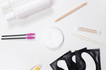 tools for correcting eyelashes and eyebrows on the surface. beautician