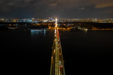 Aerial view on metro bridge at night in Kyiv.