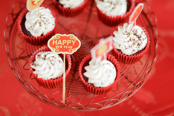 happy new year label on the cupcake