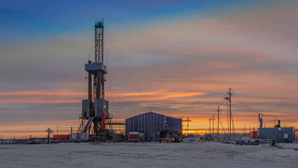 Drilling wells at an oil and gas field in the Arctic region. Production infrastructure and drilling...