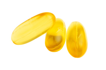 Yellow capsules of omega-3, fatty acid pills, nutritional supplement, isolated on transparent background