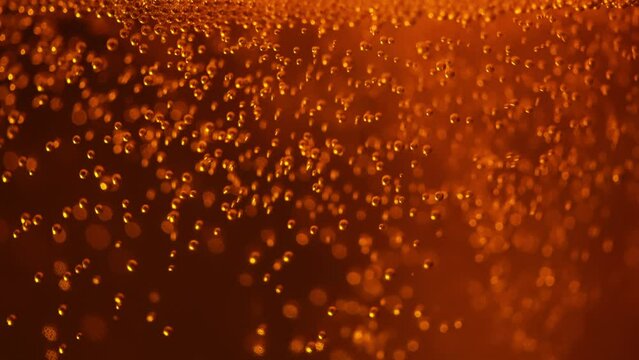 Beer foam rises to the top. Carbonated drink. Bubbles