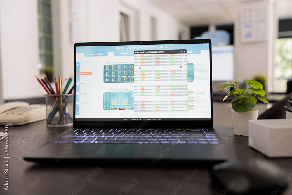 Poster close up view of laptop display with leading financial data software in a investment trading company