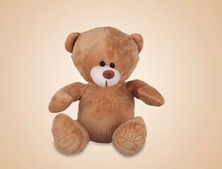 Cute soft toy bear on the desk.