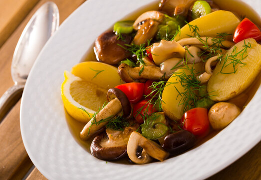 Mushroom hoosh boiled with honey fungus, lemon and vegetables
