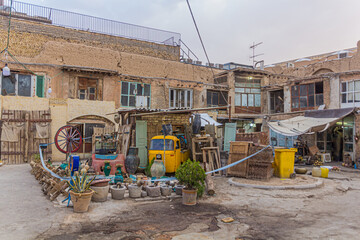 Rubbish filled courtyard in the center of Isfahan, Iran