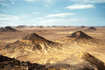 Fototapeta na wymiar Black desert in Egypt taken in May 2022