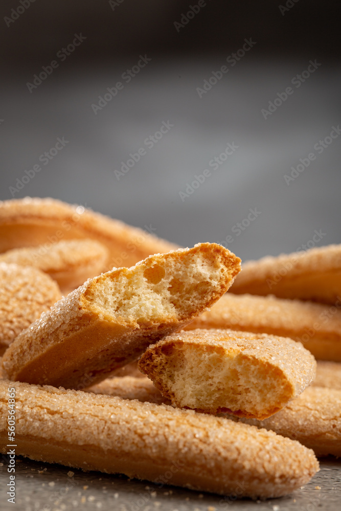 Wall mural ladyfingers cookies on the table.