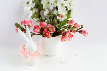 Obraz na płótnie Canvas Easter card design. spring flowers, easter eggs and easter bunny