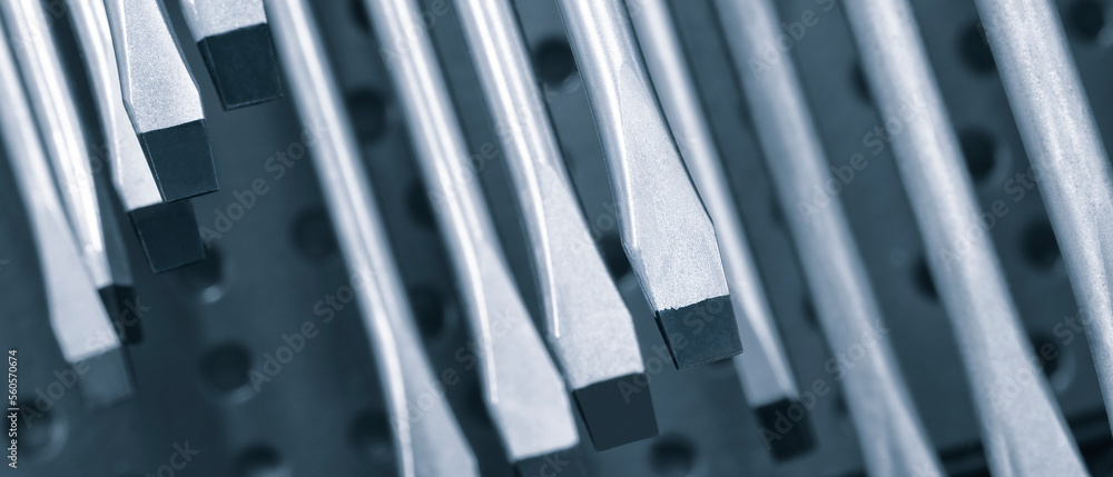 Aufkleber screwdrivers on a showcase in a tool store, tool concept background