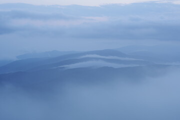 Fototapeta premium Landscape photo of mountains and clouds at dawn. Feeling gentle.