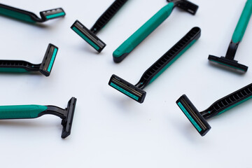 Men razors on blue background.