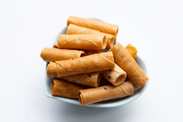 Thai crispy coconut rolls on white