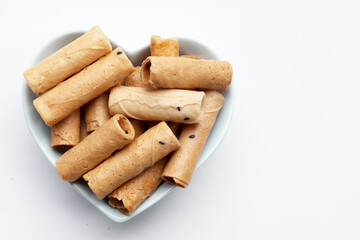 Thai crispy coconut rolls on white