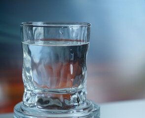 Water in a glass glass, isolated, close-up. High quality photo