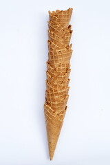 Empty ice cream cone on white background.