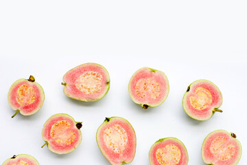 Fresh pink guava on white background.