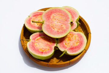 Fresh pink guava on white background.