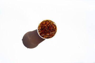 Cola with ice in takeaway cup isolated on white background.