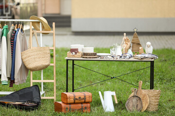 Many different items selling in yard. Garage sale
