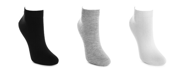 Set with different socks on white background. Banner design