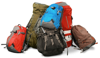 Big pile of colored travel backpacks