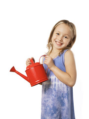 Portrait of happy smiling child girl with watering can isolated on white background. © Sergey