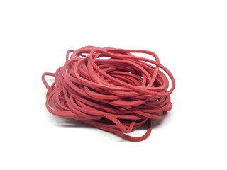 Pile of red rubber bands isolated on a white background 