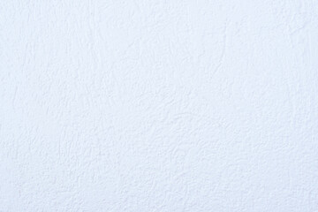 White wall texture background. White decorative plaster with abstract spots. Plastering, Finishing coating for building