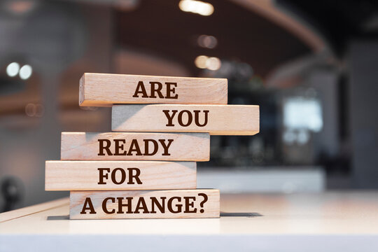 Naklejki Wooden blocks with words 'Are you ready for a Change?'.