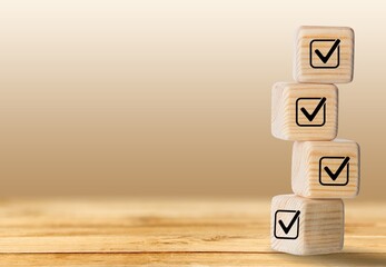 Checklist concept, wooden blocks cubes with icons