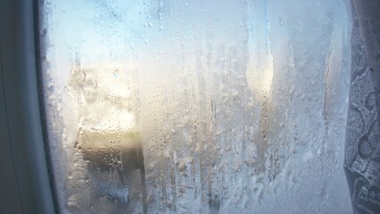 Frozen window glass in winter