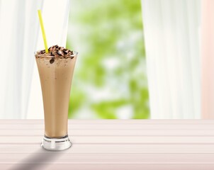 Tasty sweet iced coffee in a big cup