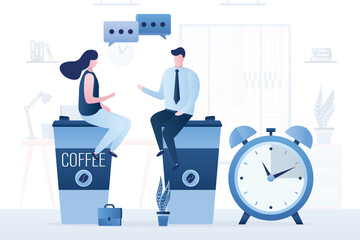 Office workers sit on large mugs of coffee and talk. Alarm clock, coffee break, colleagues talking work. Pause in work process, rest, recharge. Office workflow, room interior on background.