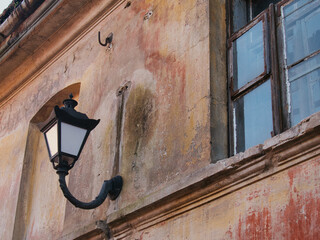 Lamp on an old building in Vilnius