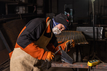 Fototapeta premium Work in a mechanical workshop with various tools
