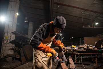 Work in a mechanical workshop with various tools
