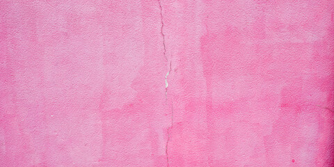 old ancient pink surface outdoor facade wall with crack texture wallpaper grunge background