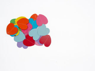 colorful paper hearts on white background, top view, copy space area, Valentine's Day or birthday concept