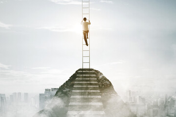 Businessman climbing stairs - Powered by Adobe