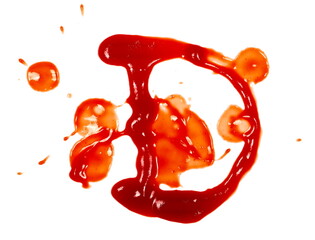 Blood effect, ketchup splashes in shape letter D, stains isolated on white background, tomato pure...