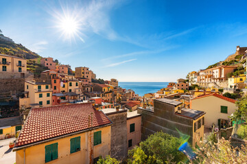 Fototapeta na wymiar Colorful apartment homes in touristic town, Riomaggiore, Italy. Cinque Terre National Park