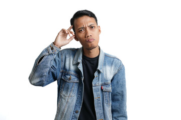 asian man wearing blue jean jacket showing expression thinking looking for idea, isolated on white background