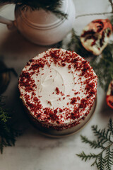 red velvet cake top view. biscuit cake with cream cheese top view. decorated cake with red crumbs...