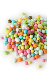 Fototapeta na wymiar pile of colorful sweet balls, multi color sugary candy isolated on white background, selective focus