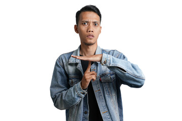 Asian man wearing blue jean jacket gesturing silence, don't make noise. Isolated by white background