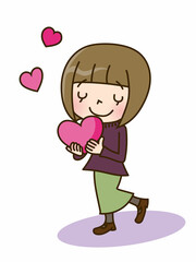 ハートを抱える若い女性