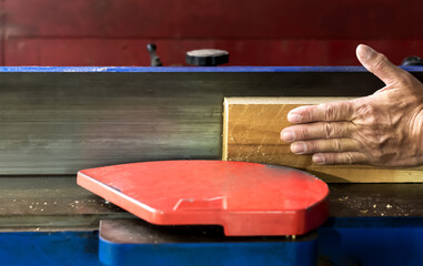 Close up carpenter hands working in carpentry workplace, Carpenter Concept