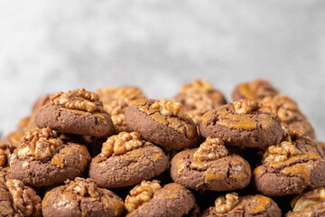 Cocoa and walnut cookies. Fresh walnut cookies. Bakery products. close up